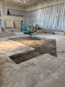 Floor cuts in the Splash Landings Indoor Aquatic Center construction project.