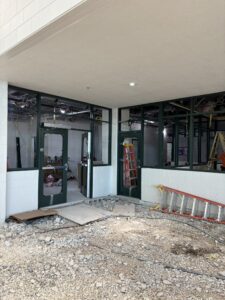 Construction photo of the interior spaces and front desk at Splash Landings.